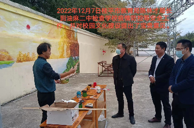  球友会网页版美术教师到油麻二中绘制艺术墙活动